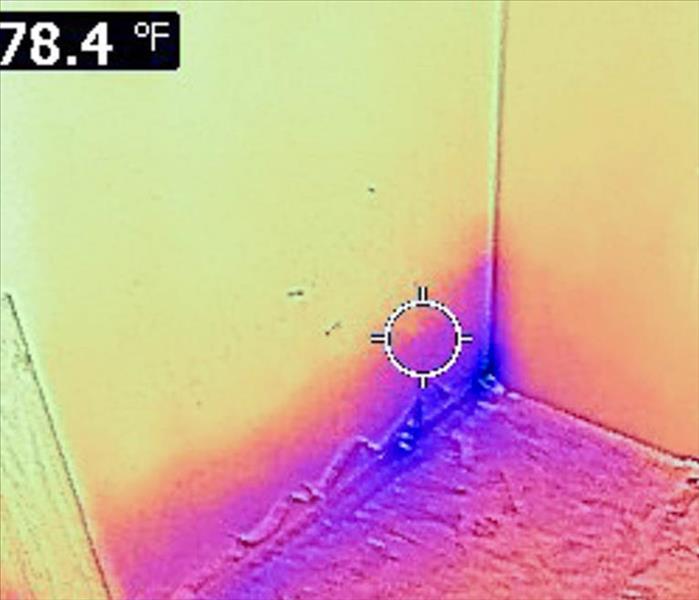 Infrared image of moisture present in a wall. 